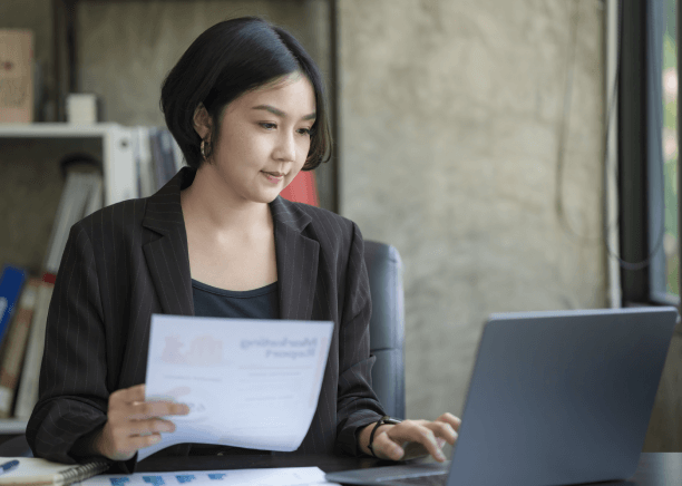 A translator working on certified USCIS translation services for personal documents in New York, ensuring legal compliance.