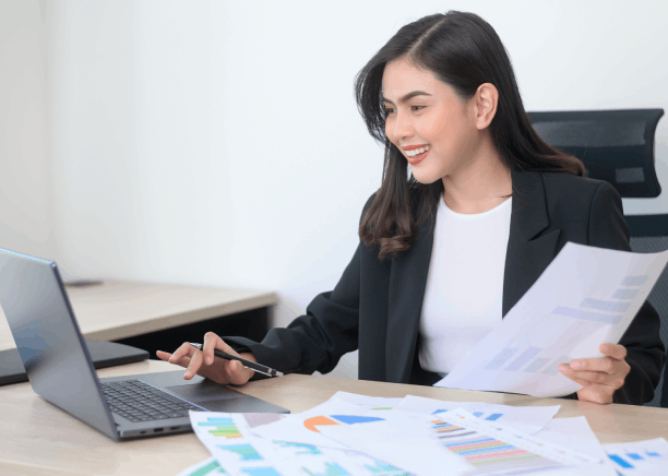 Expert translator providing Marriage Certificate Translation Services in New York while reviewing official documents.